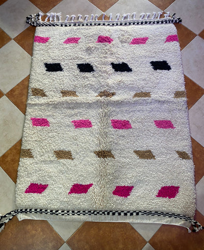 The rug is small, measuring 100x60cm, or a bed cover.