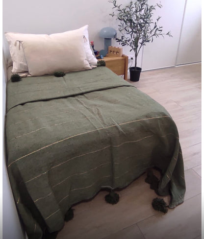 The rug is small, measuring 100x60cm, or a bed cover.